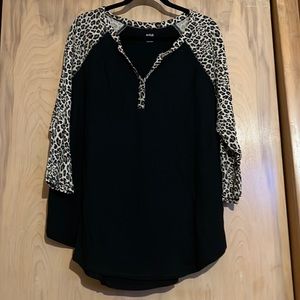 Ana v neck 3/4 sleeve shirt. Black with leopard sleeve and trim around neck
